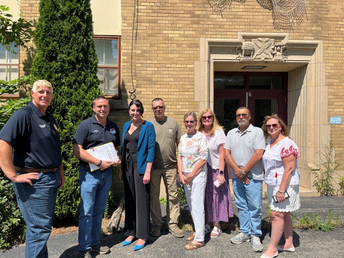 County Executive Steve Neuhaus pictured with (from left), Orange County Legislator Glenn Ehlers, Superintendent of Chester United Free School District Catherine O’Hara, along with other school members, Village of Chester Mayor Christopher Battiato, Deputy Mayor Elizabeth Reilly and Trustee Anthony LaSpina.